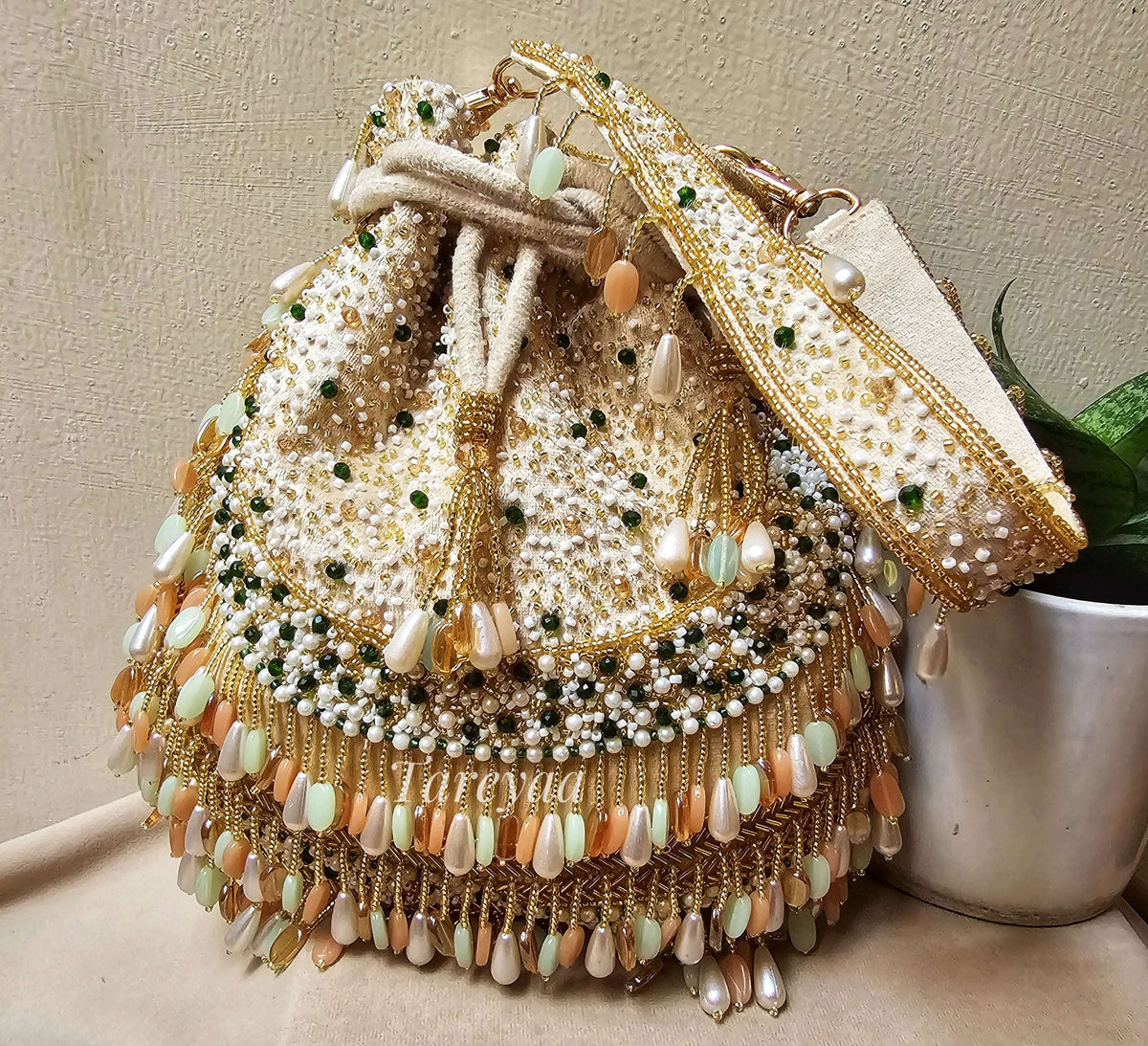 Potli - Antara plush coral beaded beige potli - Tareyaa