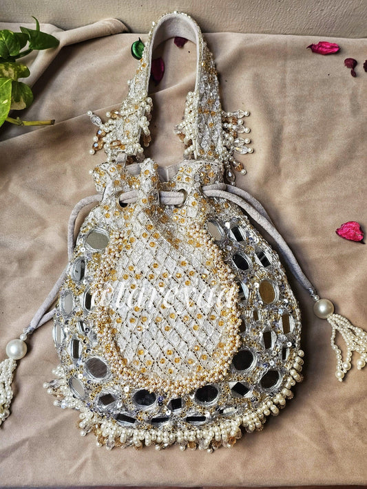 Potli - MehNoor Mirror Greytone Potli with Pearlwork showcasing intricate designs and embellishments.