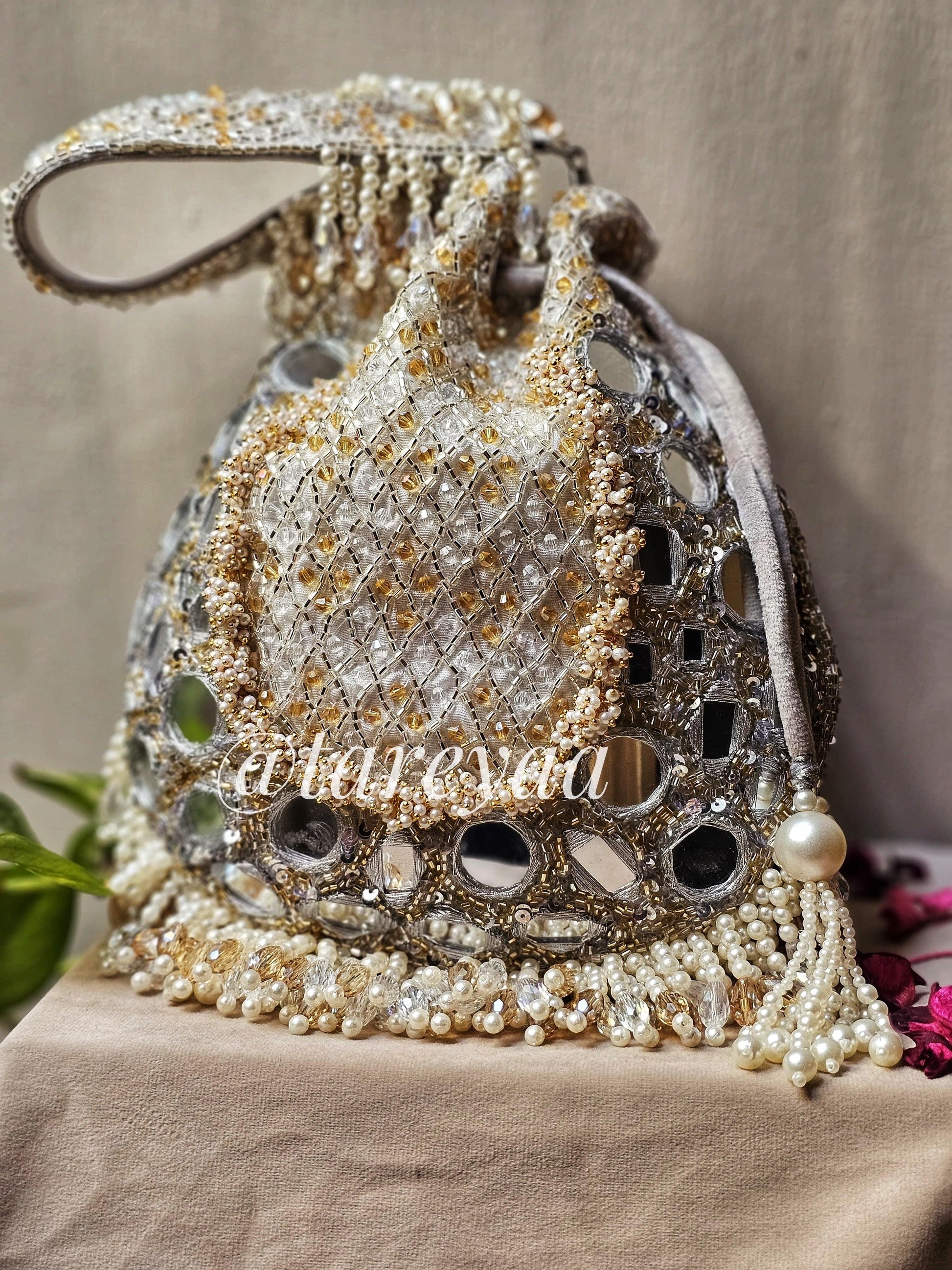 Potli - MehNoor Mirror Greytone Potli with Pearlwork, showcasing intricate mirror and pearl embellishments.