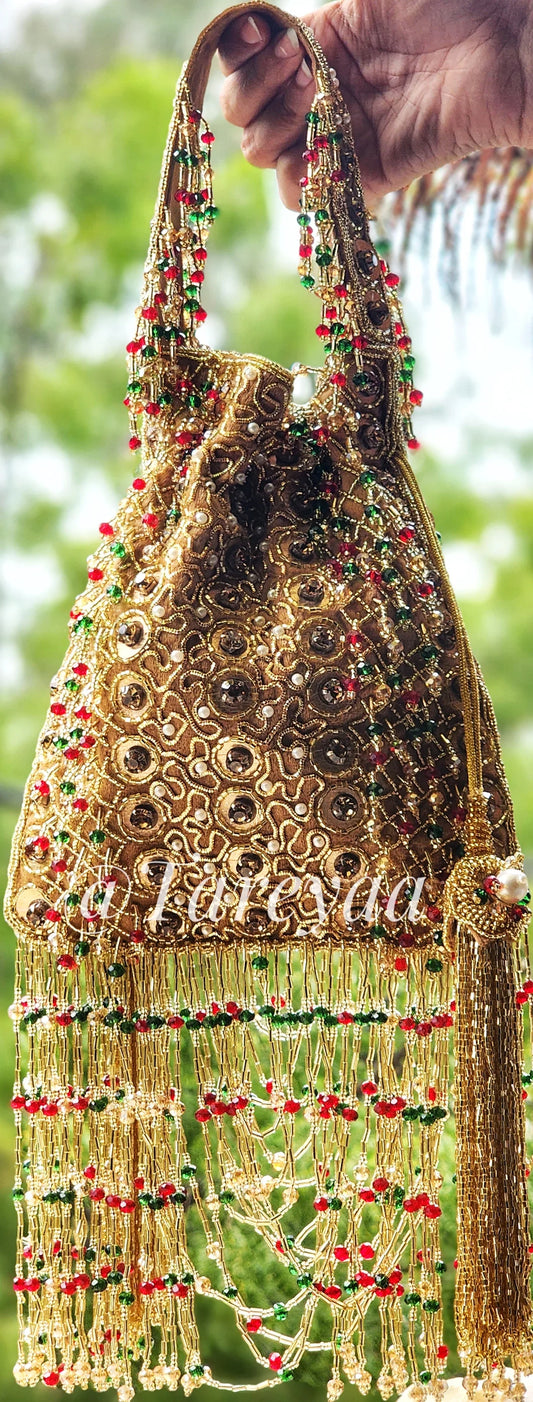 Ghoomar emerald green red potli - Tareyaa