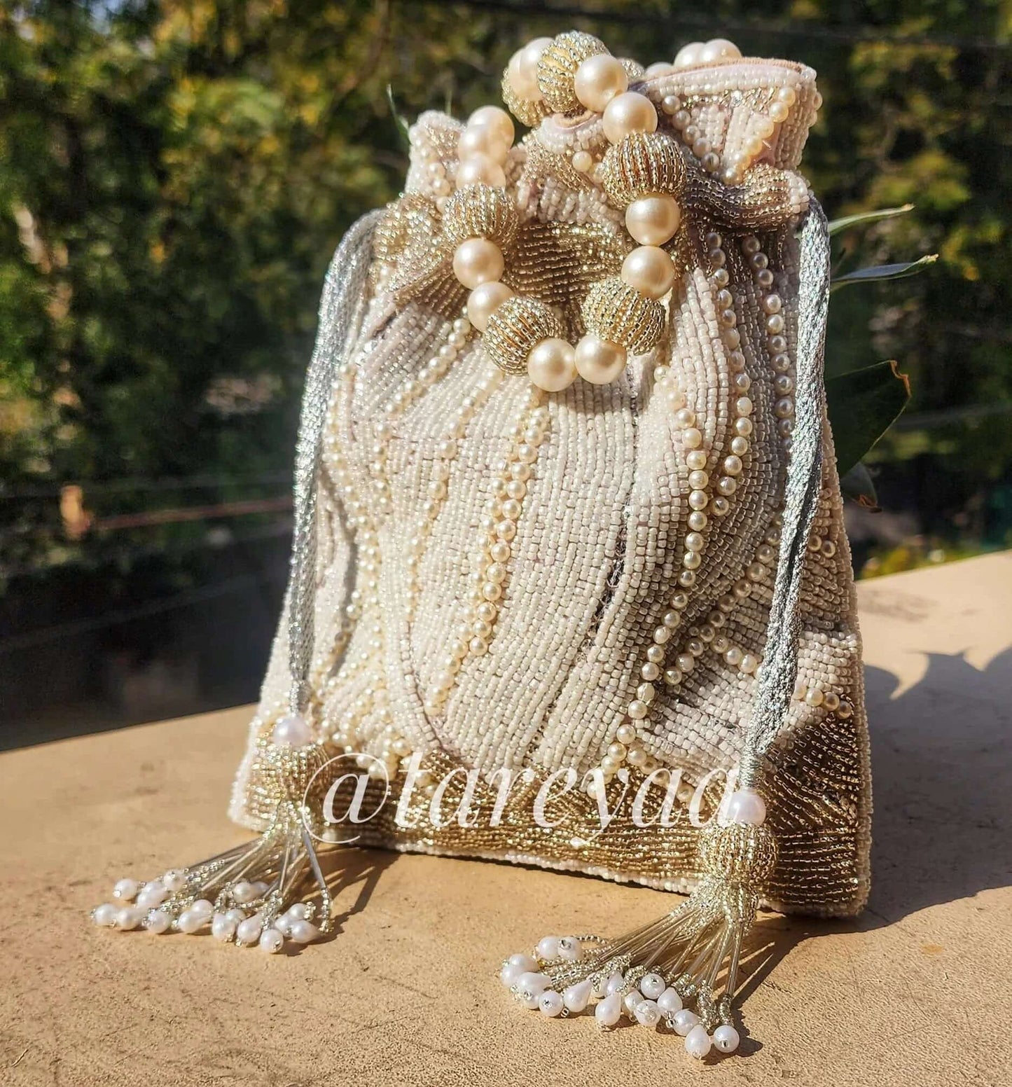 Layla Pearl Potli with pearl handle - Tareyaa