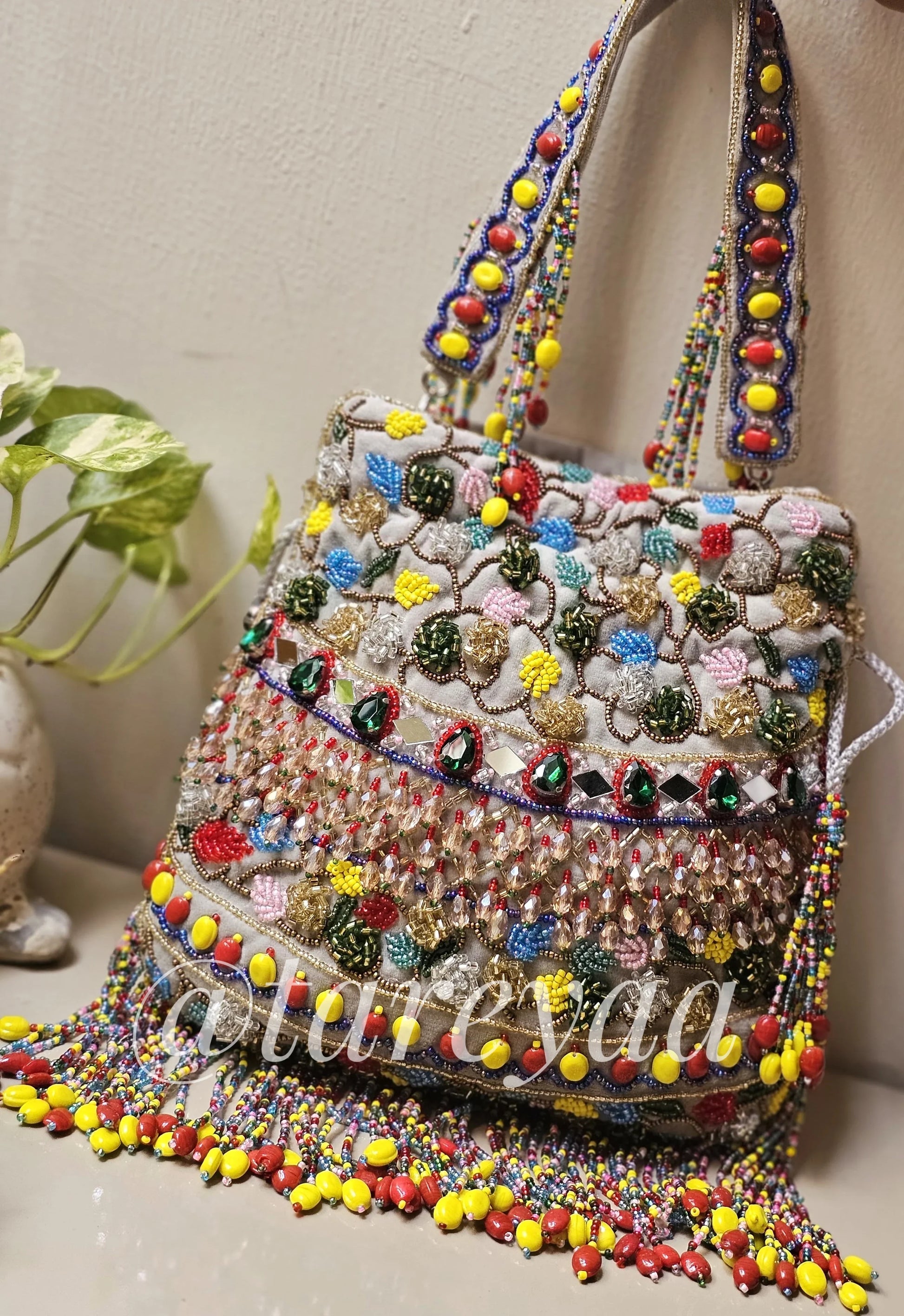 Navratri Mutlicoloured Potli with handle - Tareyaa