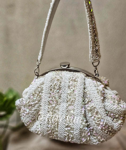Potli - Ivory Batua Shape White bag with embellished stones and cutdana designs for a sophisticated look.