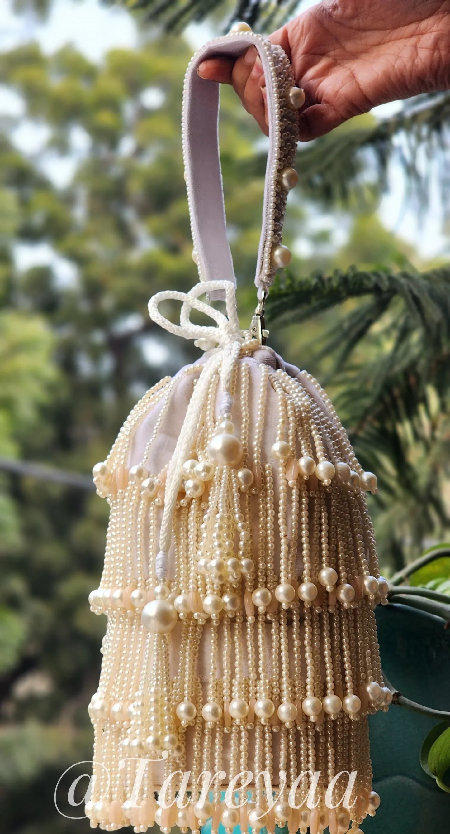 Jade pearl potli with handle - Tareyaa
