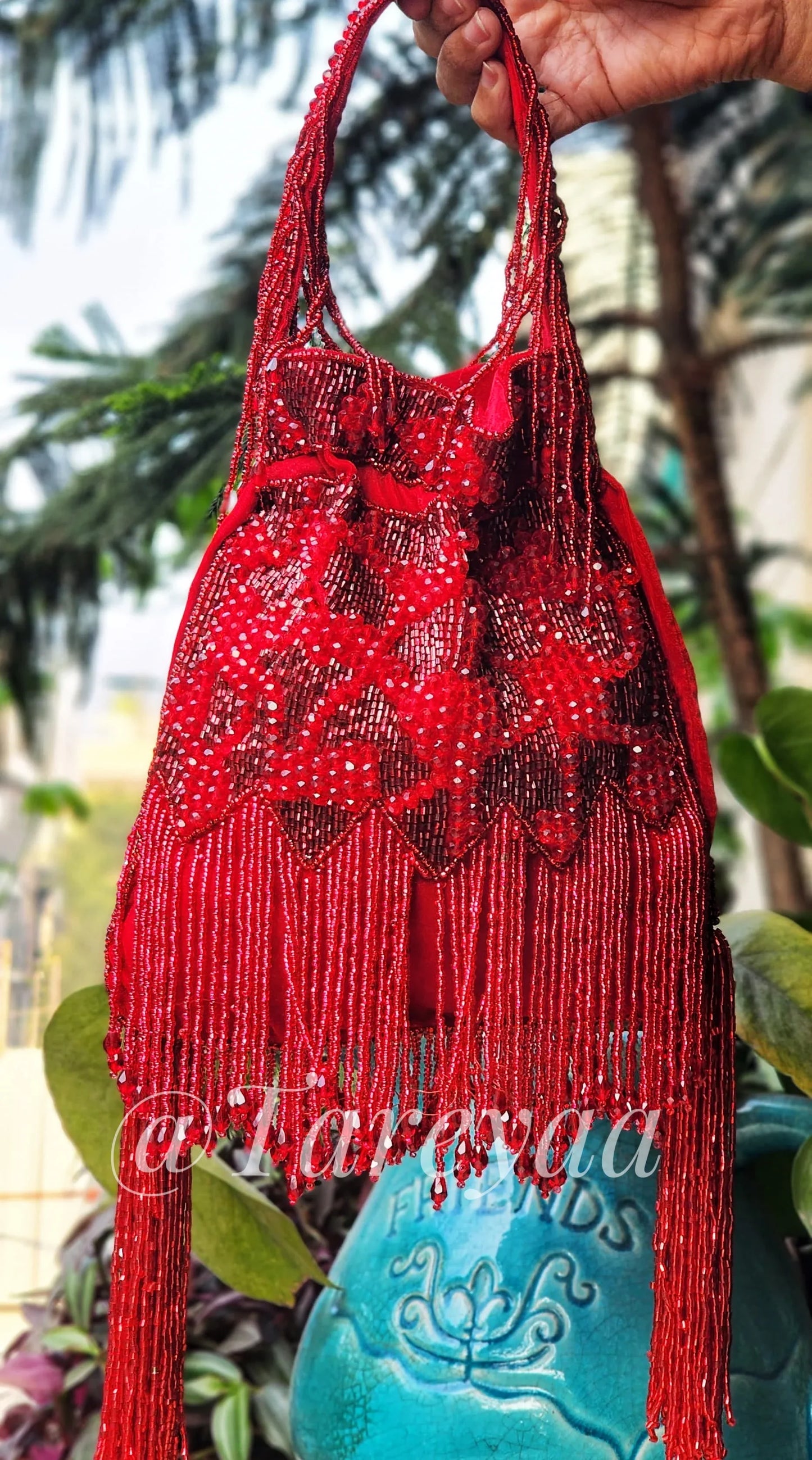 Jodha embedded potli with handle - Tareyaa