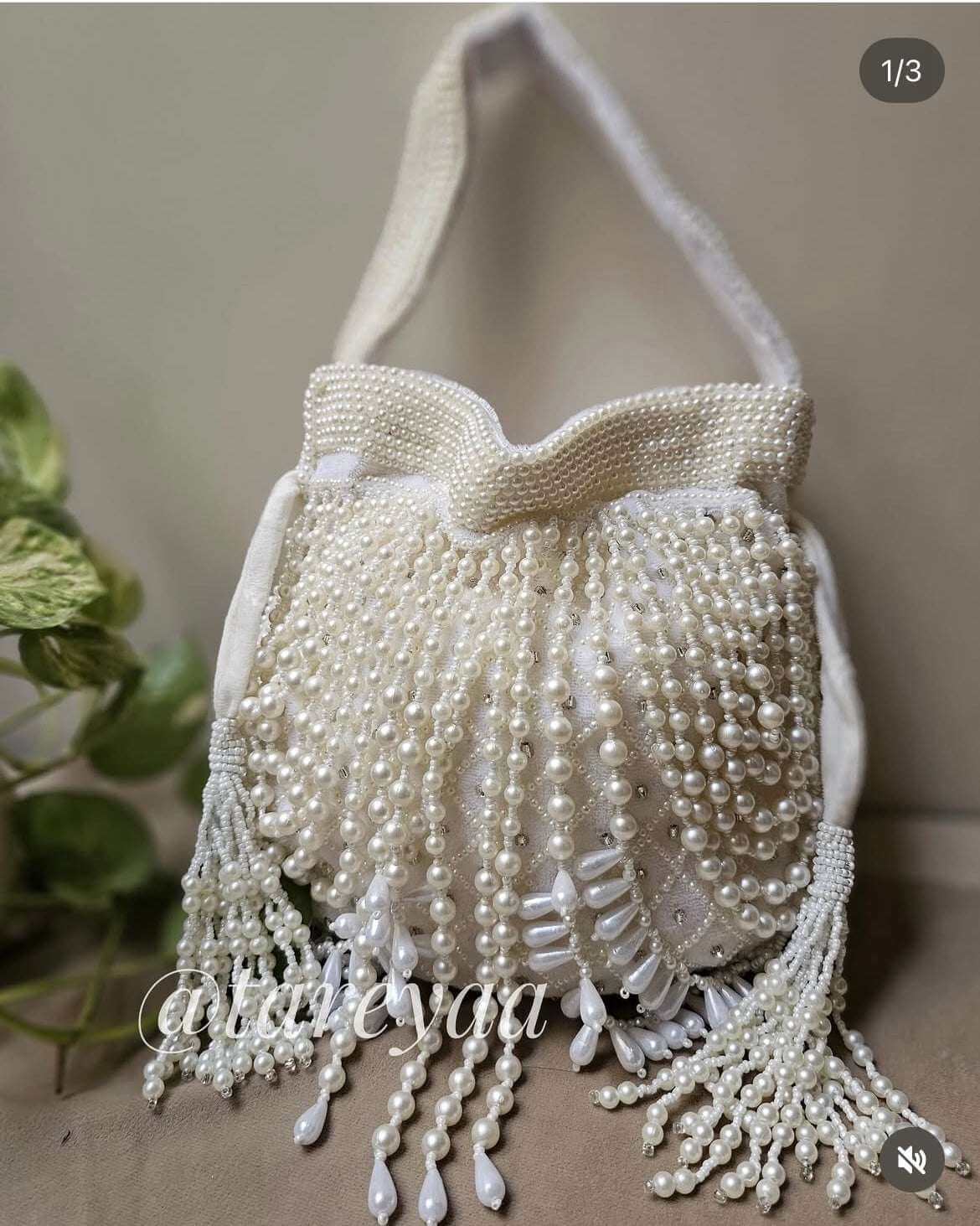 Raabta Pearl Potli | All-White Hand-Strung Pearl Potli