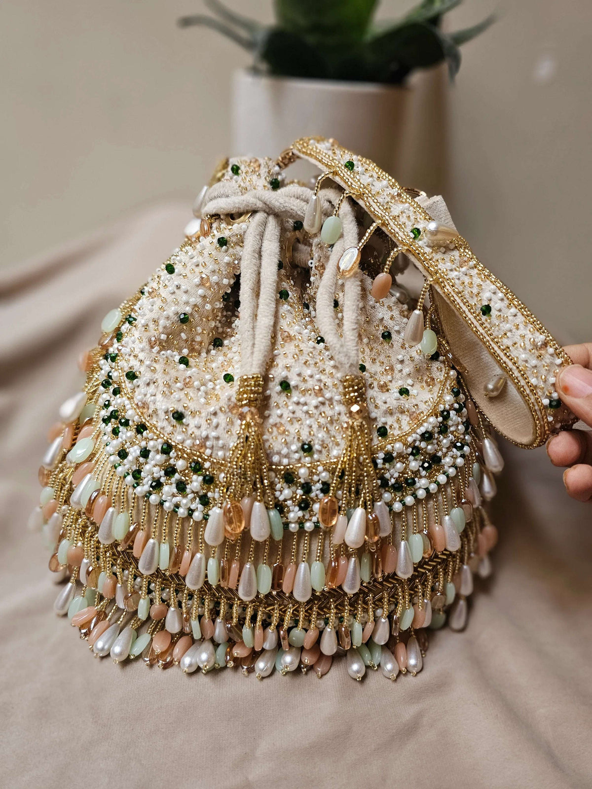 Potli - Antara plush coral beaded beige potli - Tareyaa