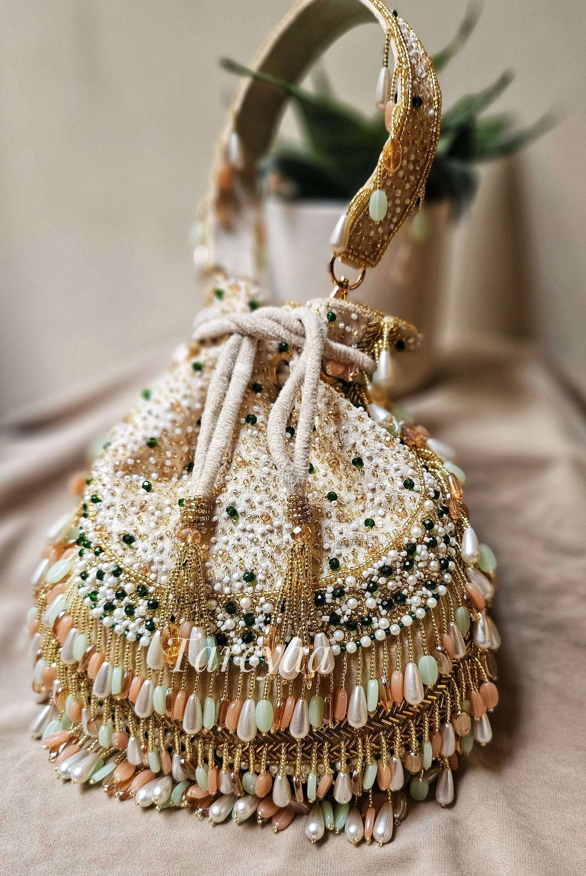 Potli - Antara plush coral beaded beige potli - Tareyaa