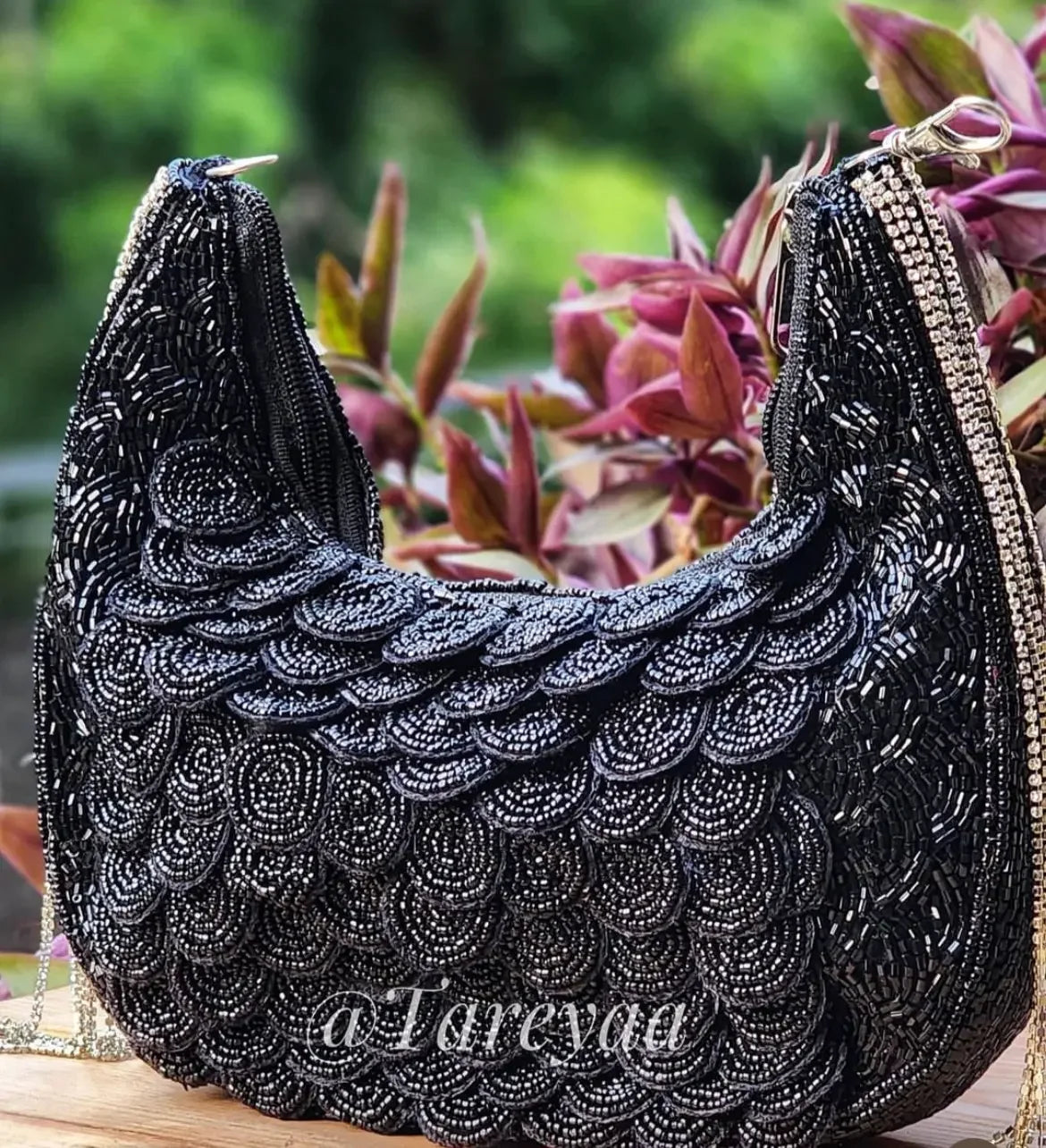 Black designer crescent clutch bag Indian wedding accessory
