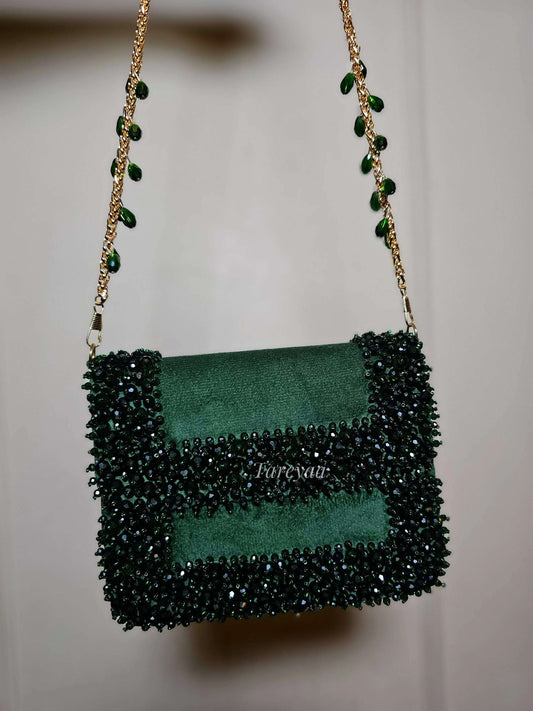 Narma bottle green velvet clutch bag with stone and crystal embellishments and long sling by Tareyaa — Indian bridal bag
