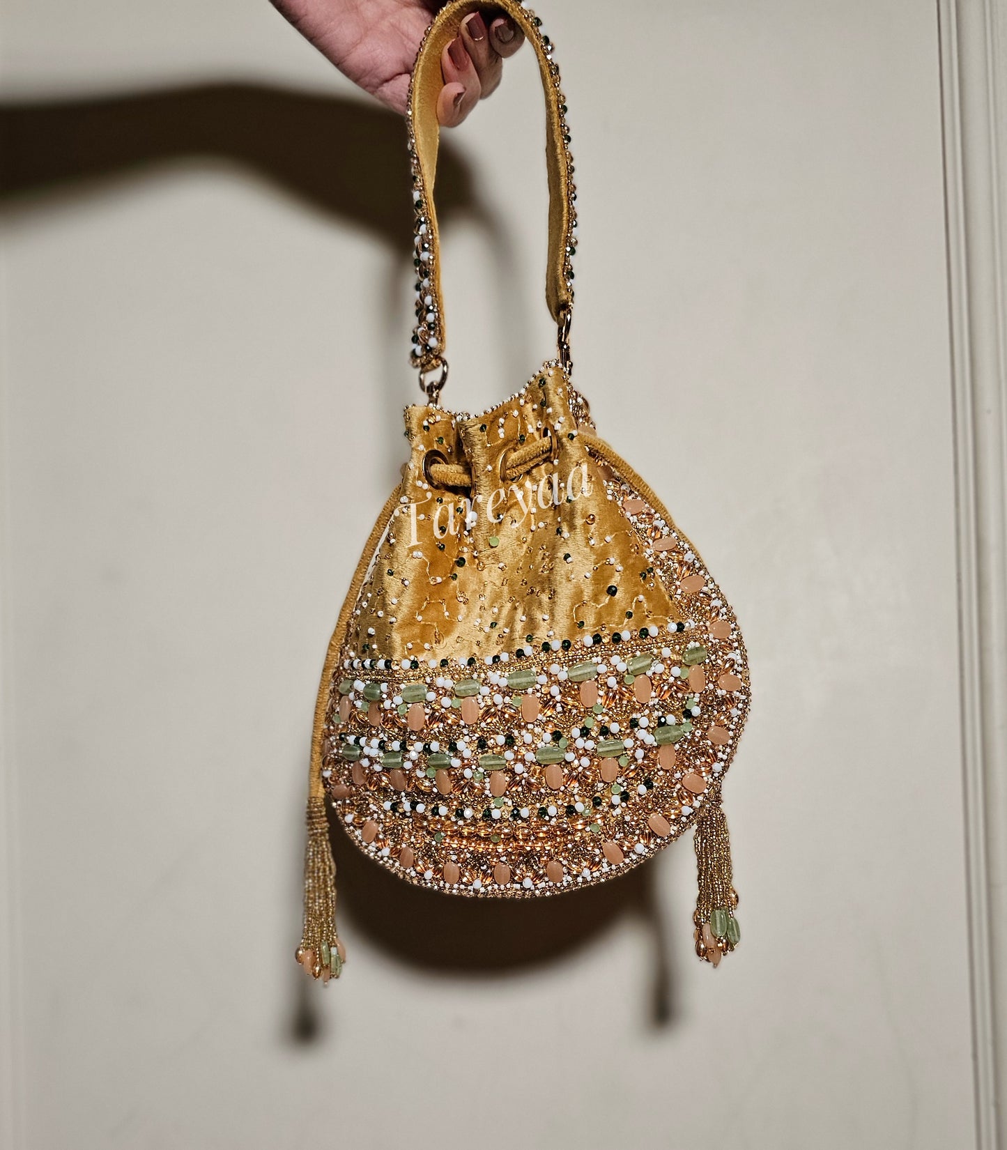 Pastel beige potli- Saanjh - Tareyaa