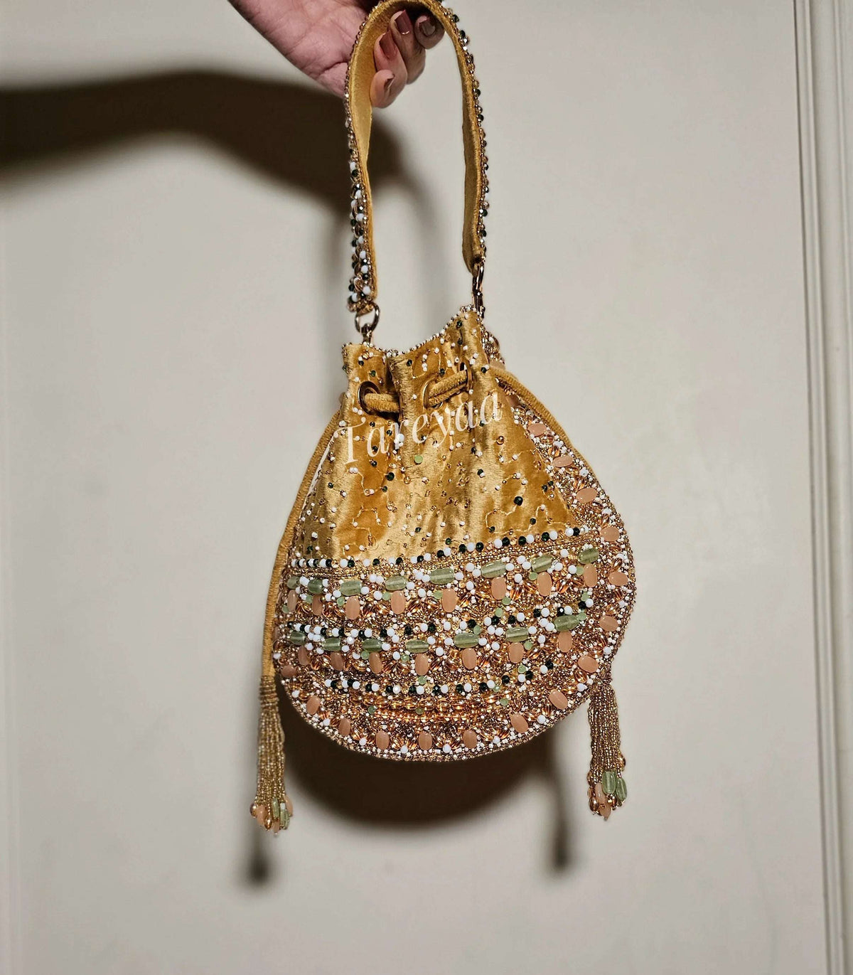 Pastel beige potli- Saanjh - Tareyaa