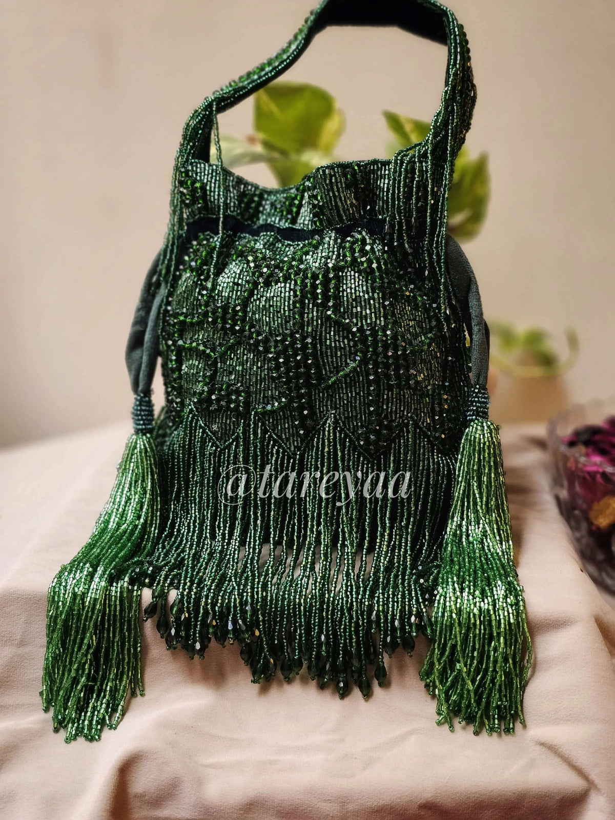 Jodha embedded potli with handle - Tareyaa